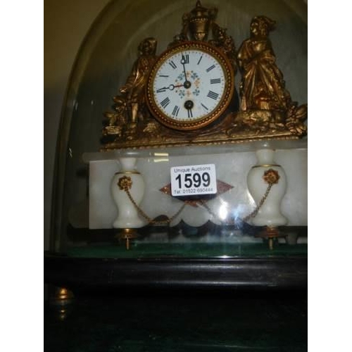 1599 - A Victorian mantel clock surmounted figures and under glass dome. in working order. COLLECT ONLY.