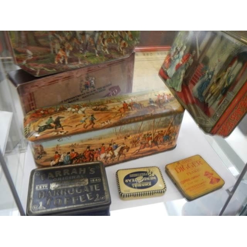 1601 - A mixed lot of collector's tins.