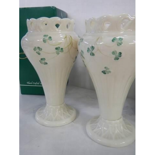 1612 - A boxed pair of Belleek vases.