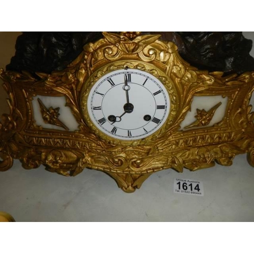 1614 - A good bronze and spelter mantel clock with silk suspension. COLLECT ONLY