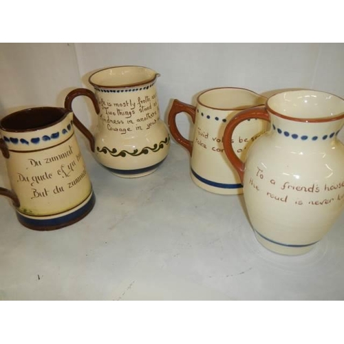 1619 - Four assorted Torqay motto ware jugs, all in good condition.