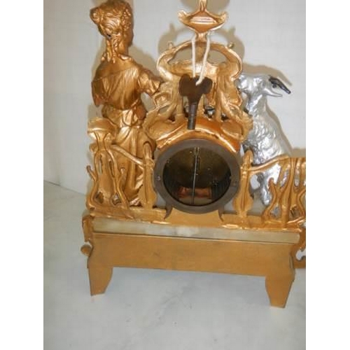 1620 - A good old spelter mantel clock complete with key and pendulum. COLLECT ONLY