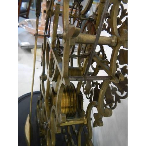 1624 - A good 20th century skeleton clock under glass dome in working order. COLLECT ONLY.