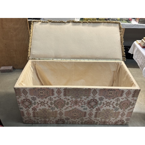 449 - A large tapestry covered ottoman/blanket box. 61cm x 125cm x 64cm high COLLECT ONLY