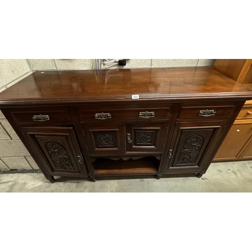 454 - A mahogany sideboard with carved floral panels, 158cm x 52cm x 94cm COLLECT ONLY.