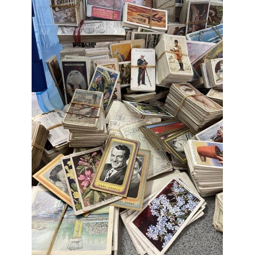 1630 - A large collection of cigarette and tea cards in three boxes.