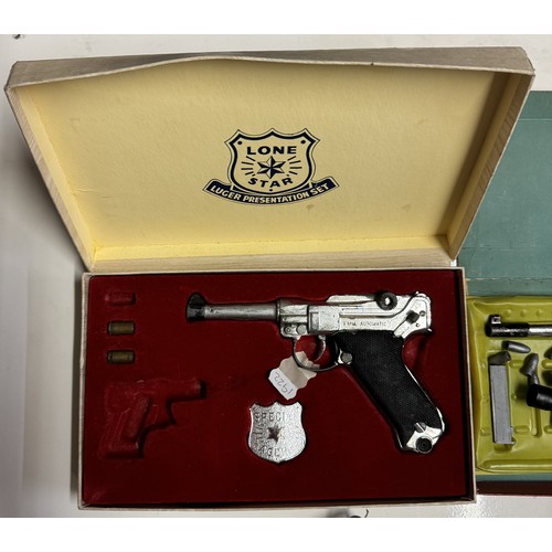 187 - A boxed Lone Star Luger presentation set. Incomplete  A 7.63mm automatic toy gun A/F, & A catapult A... 