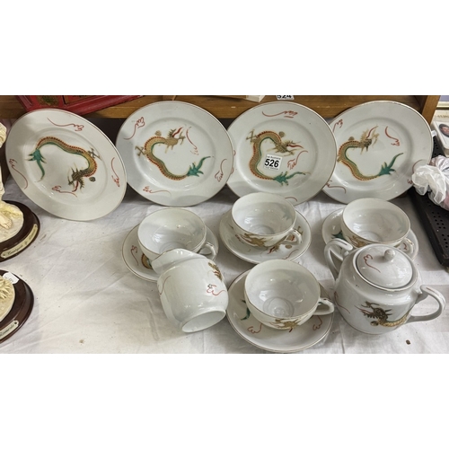 526 - A part Chinese tea set with Geisha face in bottom of cups