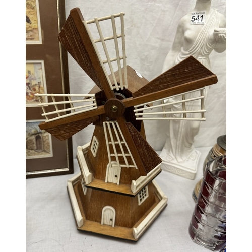 540 - A wooden windmill & clogs & a leather camel