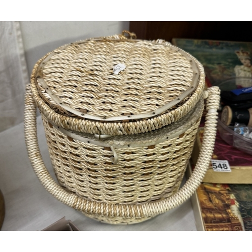 545 - A small sewing basket and contents.