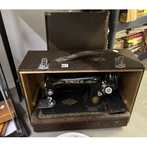 567 - A cased Singer sewing machine COLLECT ONLY