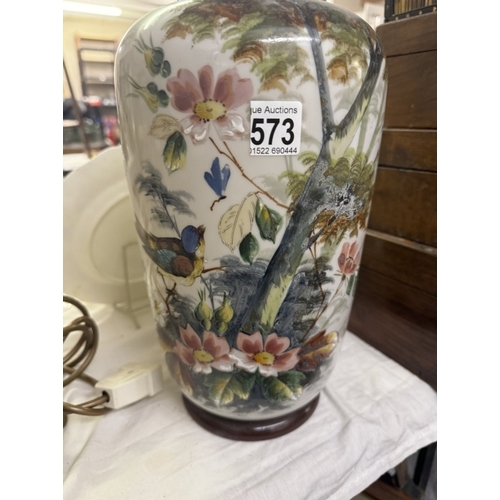 573 - A vintage hand painted vase