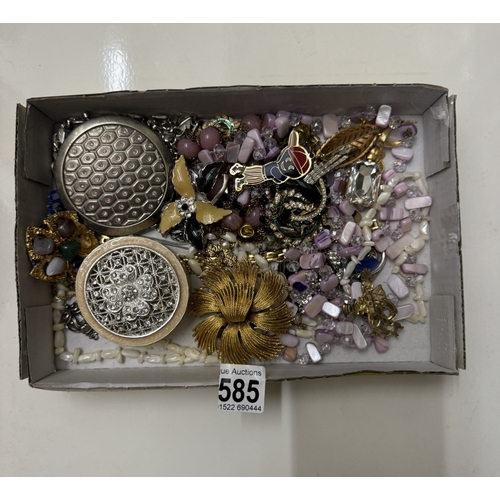 585 - A quantity of costume jewellery. compact & trinket box etc.