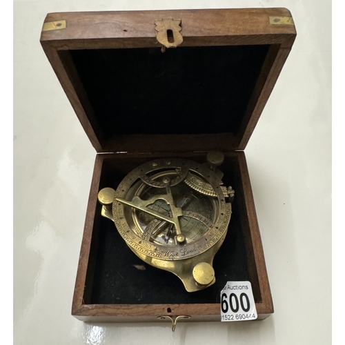 600 - A brass marine sundial in hard wood box