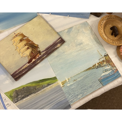 619 - A quantity of sea/coastal paintings on board