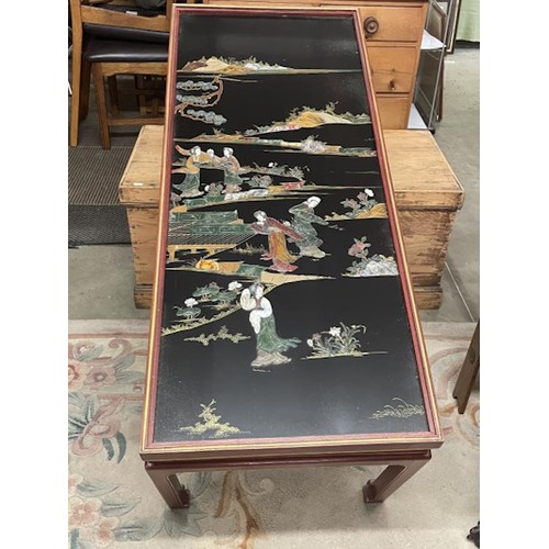 1517 - An excellent black lacquered panel with Chinese soapstone figures made into a table with a glazed to... 