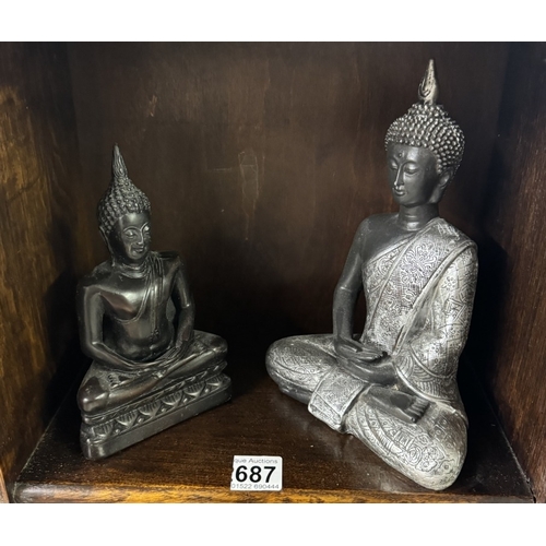 687 - A collection of 20th century oriental figures including Buddha and other Dieties.