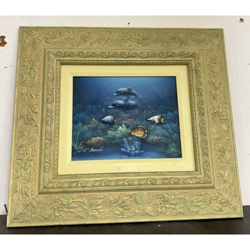 740 - A pair of ornate framed oil on boards of tropical / angel fish signed C Benett