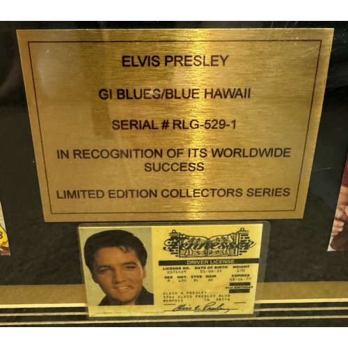 715 - A large framed & glazed collage featuring Elvis Presley with discs. Collect Only