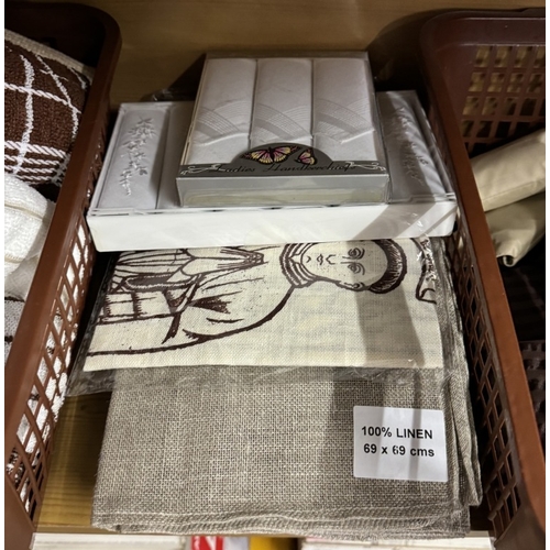 777 - A quantity of tea towels etc