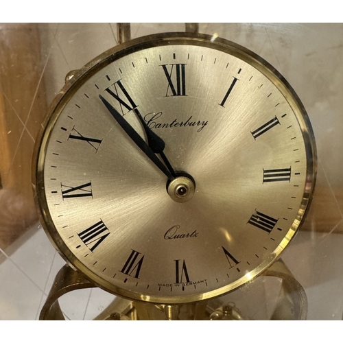 788 - A Canterbury quartz brass mantle clock