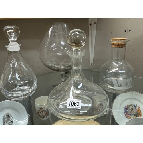 1063 - A large brandy glass & decanters