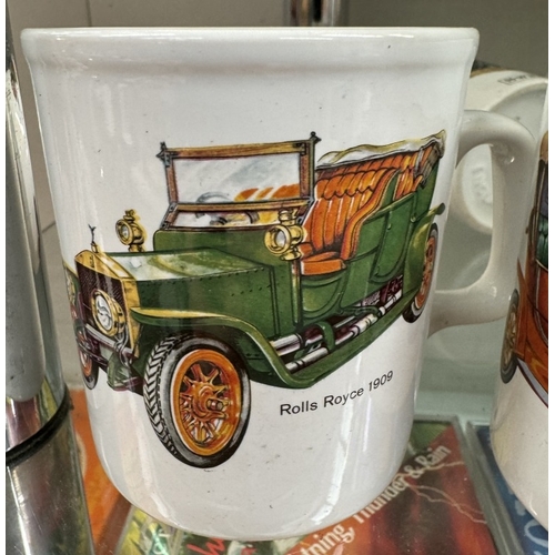 886 - 10 mugs depicting veteran cars, steam trains & Citroen 2CV