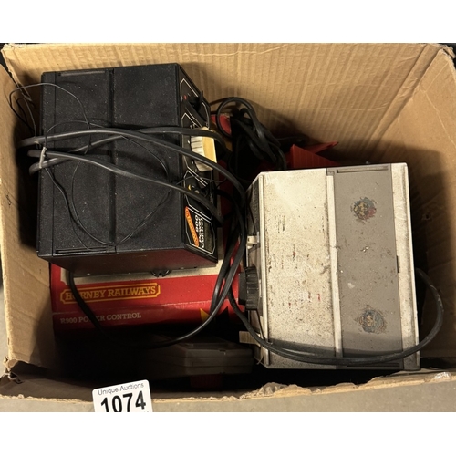 1074 - A box of Hornby controllers