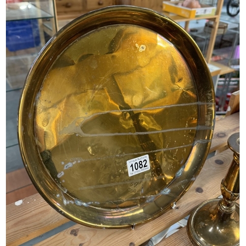 1082 - A brass Army & Navy CSL makers London lidded pot, A pair of candlesticks, oil lamp & tray