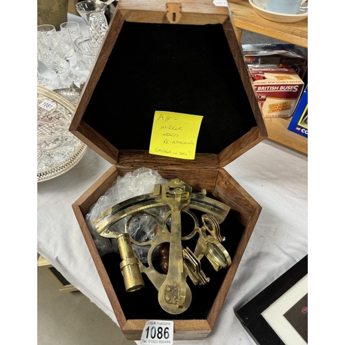 1086 - A brass sextant (needs attention) in teak box