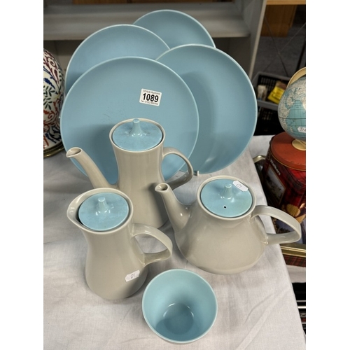 1089 - A quantity of Poole pottery tea pots, plates etc