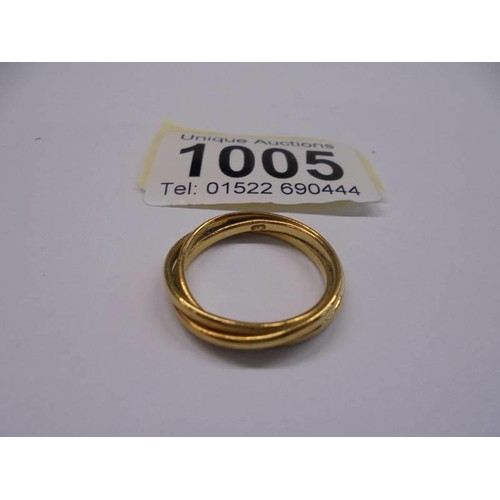 1005 - An 18ct (750) gold ring, size N, 4.5 grams.