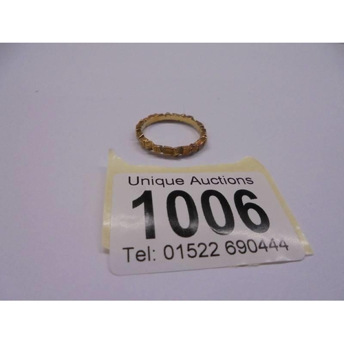 1006 - An 18ct (750) gold ring, size P, 3.4 grams.