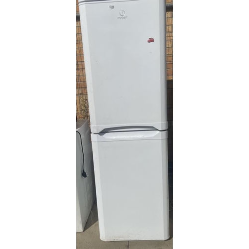 1029 - Indesit tall fridge and freezer