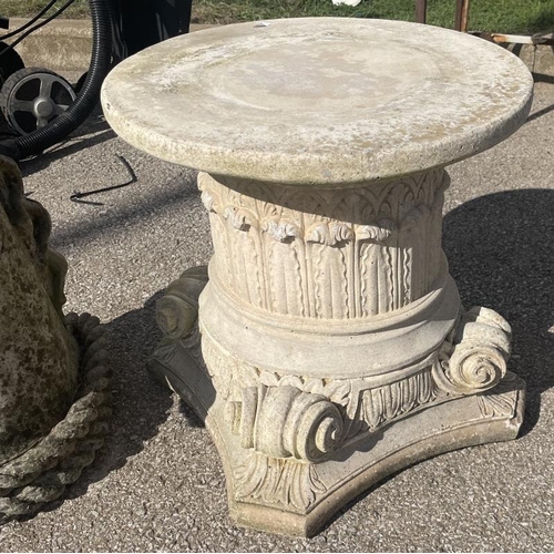 1040 - A quantity of Garden ornaments, horse heads and pillar stands