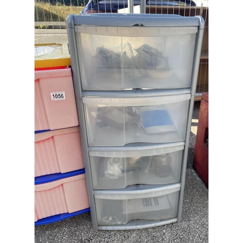 1056 - 2 plastic drawers with items in them