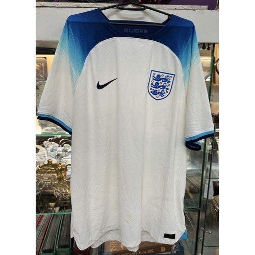 1121 - 2 England shirts