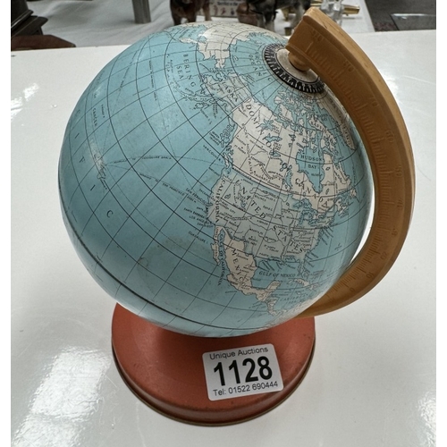 1128 - A vintage toy & plastic toy globe