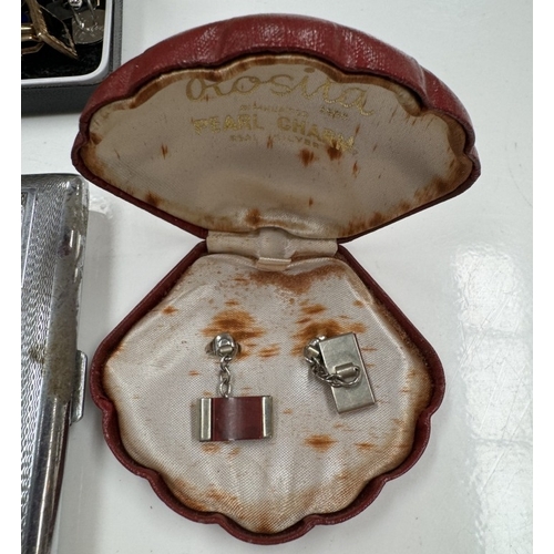 1134 - A mixed lot of cased cufflinks, cutthroat razor, A cigarette case & 2 Cruise ship models