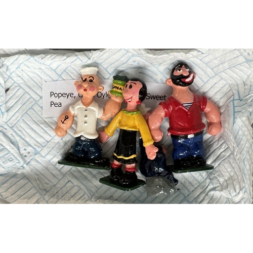 1141 - A quantity of unbranded painted white metal figurines Popeye, Punch & Judy, The Lone Ranger, Muffin ... 