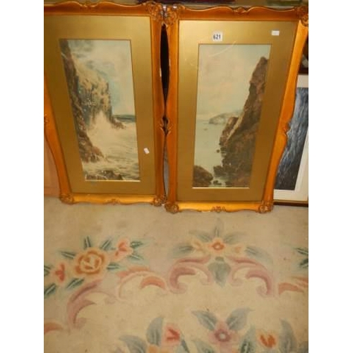 621 - A pair of early 20th century studies of calm and rough seas in gilt frames. COLLECT ONLY.