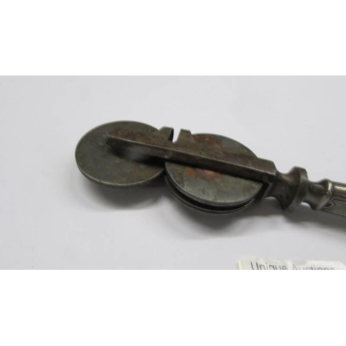 1035 - An antique knife sharpener (handle may be silver).