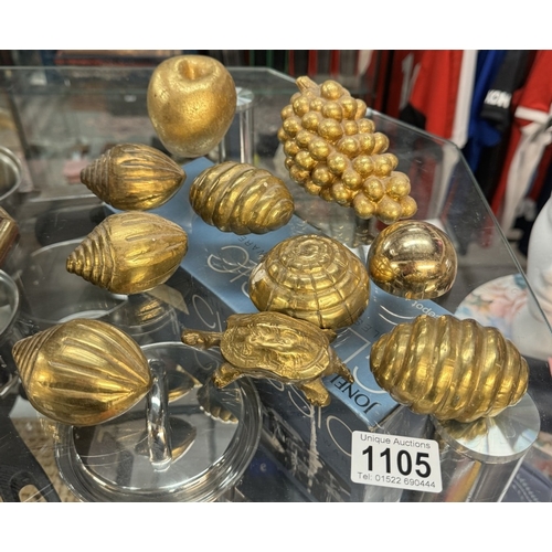 1105 - A quantity of brass sea shells, etc including tortoise and wooden fruit