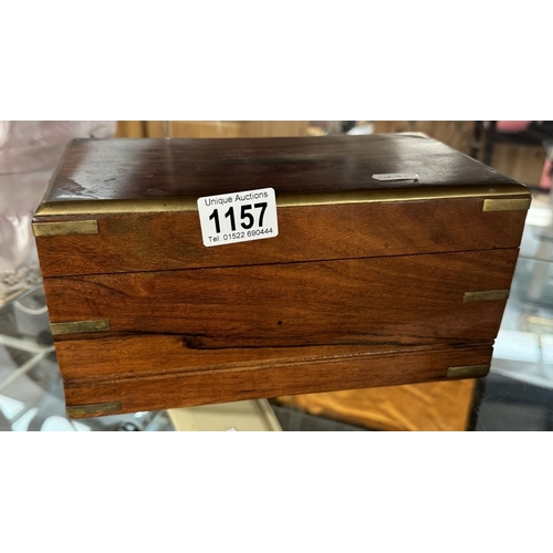 1157 - A teak box with brass inlay 25.5cm x 14cm x 12.5cm