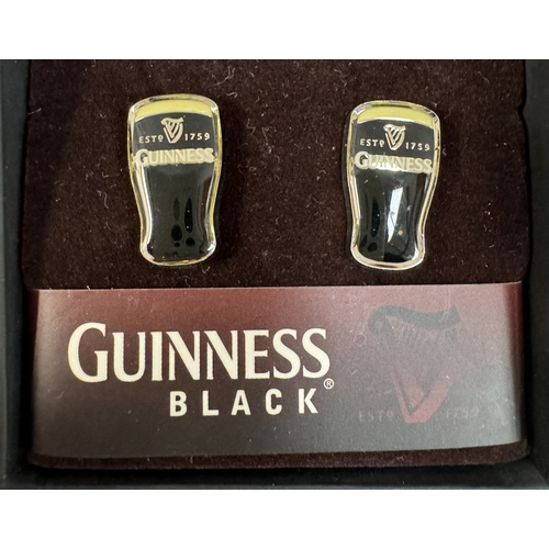 1162 - A quantity of Guinness collectors badges etc