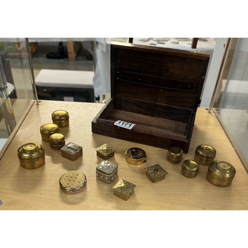 1171 - A quantity of small brass pill boxes and a brass bound wooden box