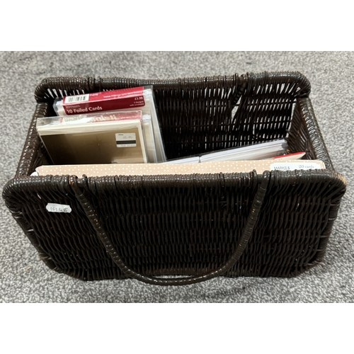 1183 - A quantity of new Christmas cards in wicker basket