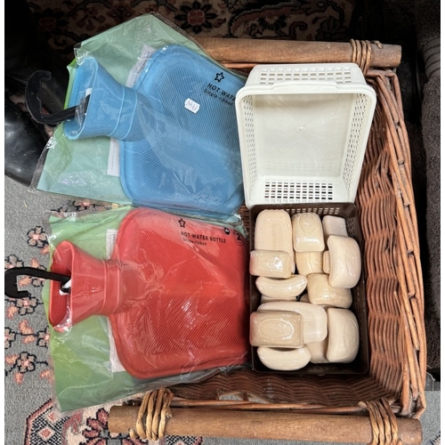 1186 - A quantity of Egyptian cotton towels etc, some new, wicker basket of soap and hot water bottles