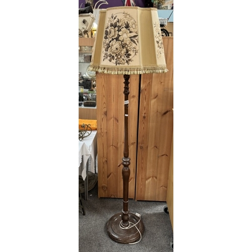 1210 - An Edwardian oak standard lamp