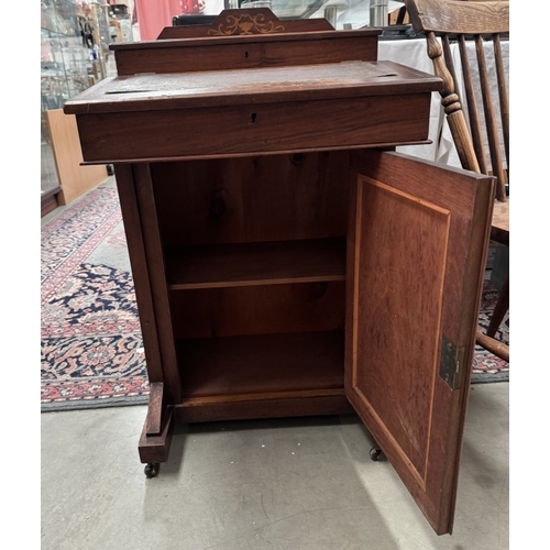 1223 - A Victorian inlaid Davenport desk